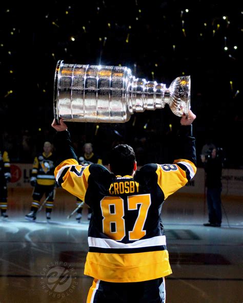 For Sure, Sidney Crosby hoists the Stanley Cup at the 2016...