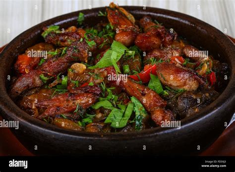Hot Pot With Meat And Vegetables Served Green Herbs Stock Photo Alamy