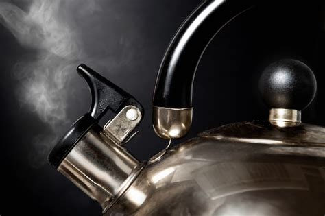 Premium Photo | Tea kettle with boiling water