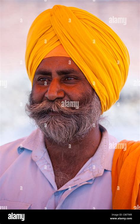 Sikh Indian man wearing traditional turban at Bharatpur, Northern India ... 
