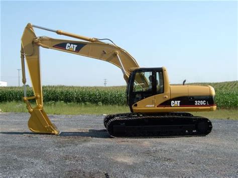 Caterpillar 320 - specs, photos, videos and more on TopWorldAuto