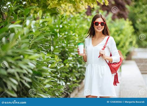 Portrait Of Beautiful Brunette Girl Walking Down The Street Stock Photo Image Of Leisure