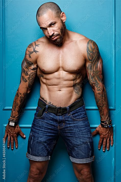 Studio Portrait Of A Muscular African American Or Latino With A Naked Torso Male Strength And