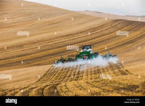 Case Quadtrac Tractor Pulling An Anhydrous Ammonia Tank And Applicator