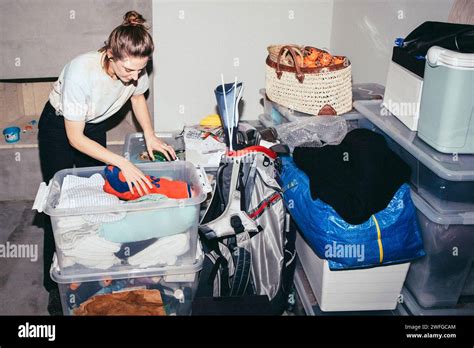 woman sorting  clothes  res stock photography  images alamy
