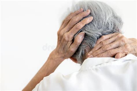 Old Man Suffering From Nape Neck Pain At Home Stock Photo Image Of