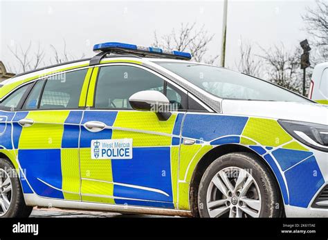 Low pov/angle, side view (offside) of police car belonging to West ...