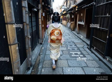 A Geisha Walking In Street In Gion Kyoto Japan Stock Photo Alamy