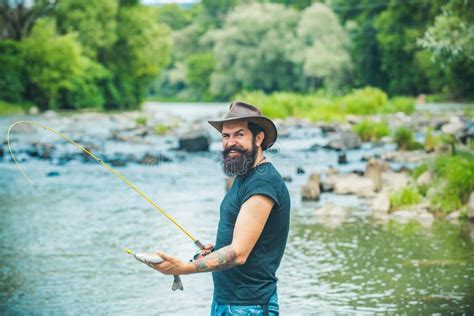 Hipster Bearded Man Catching Trout Fish Fisherman Caught A Fish Man