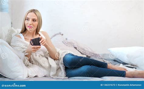 Lonely Barefoot Woman Wrapped In Plaid Drinking Hot Beverage And Thinking Full Shot Stock Video