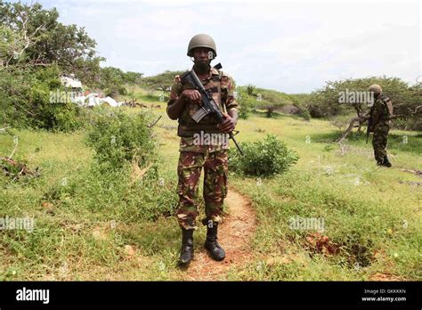 An Amisom Soldier From Kenya Defence Force Stands Guard During The