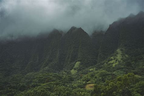 HD wallpaper: green woods across cloudy mountain, nature, outdoors, slope, weather | Wallpaper Flare