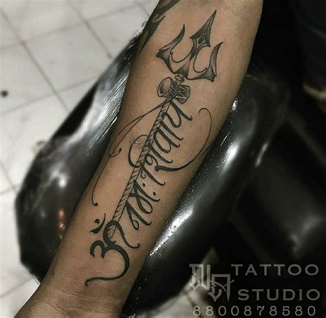 Om Namah Shivay Trishul tattoo done at N.A Tattoo Studio by Abhishek ...