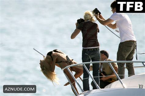Pamela Anderson Sexy Poses Topless In A Bikini On A Boat During A Photoshoot In Cannes Aznude