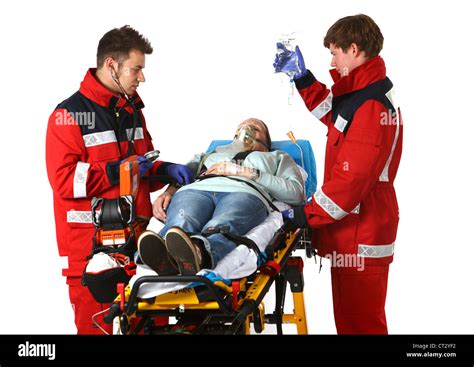 Fire Service Paramedics With Emergency Equipment Stock Photo Alamy