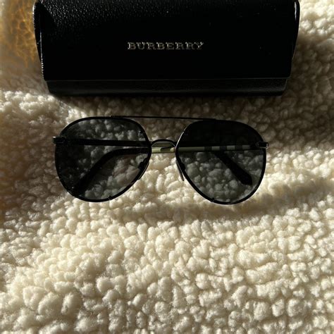 Burberry Women's Black Sunglasses | Depop