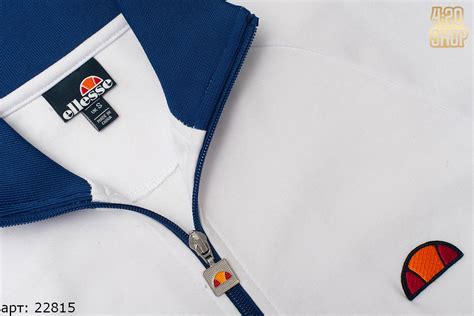 олимпийка ellesse (бел.красн.зел.поло.грудь.син.резинк)