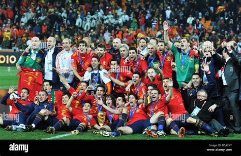 The Spanish Team Celebrates With The Trophy After The 2010 Fifa World