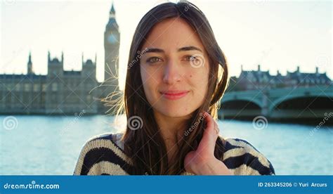 Woman Face And Windy Hair In City Location By River Thames London On