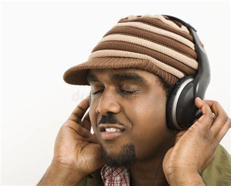 Man Relaxing To Music Stock Image Image Of Knit African 4489305