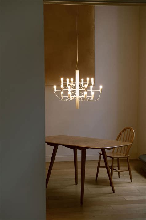 The 2097 Chandelier By Flos Stuns In Matte White