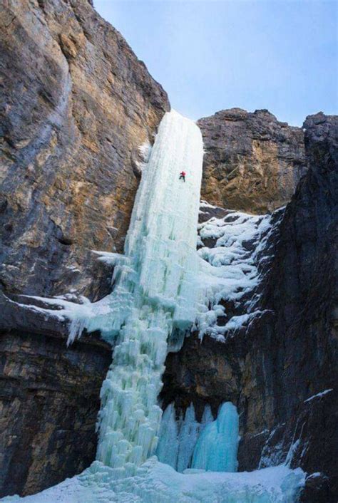 Climbing A Frozen Waterfall At Ghost River Wilderness Area Near Banff