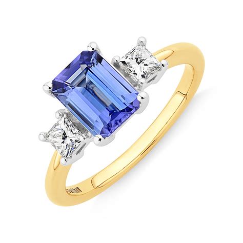 Tanzanite Ring With Tw Of Diamonds In Kt Yellow And White Gold