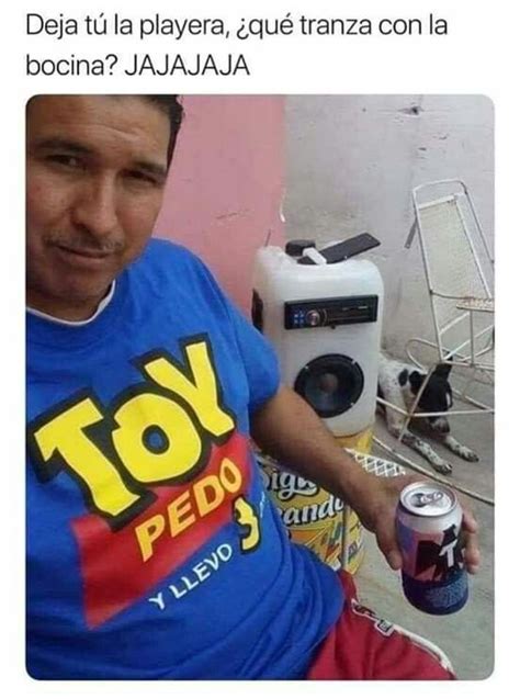 A Man Sitting Down With A Can Of Soda In His Hand