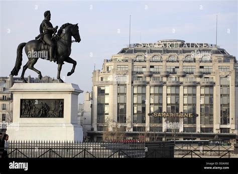 The equestrian statue of the King Henry IV on Pont Neuf New Bridge with ...