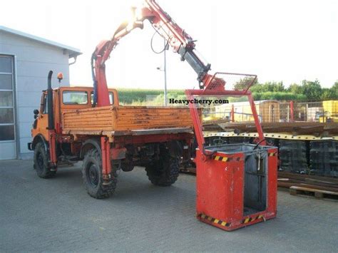 Unimog U1250 With Crane And Basket Work Pk7000a 1990 Tipper Truck Photo