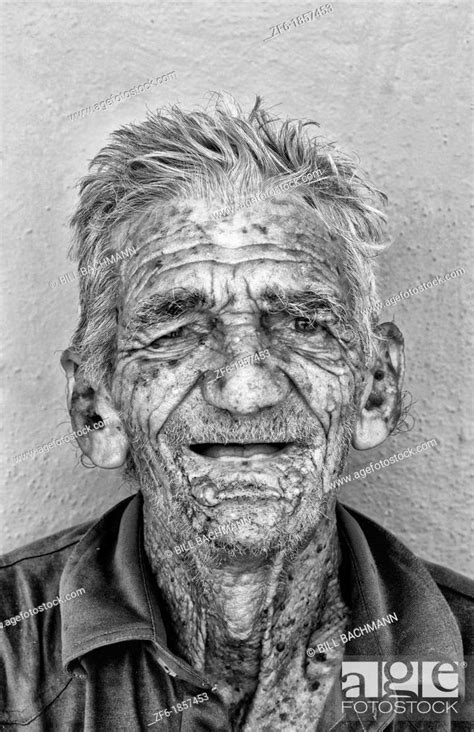 Old man with wrinkles portrait in old colonial village of Trinidad Cuba ...