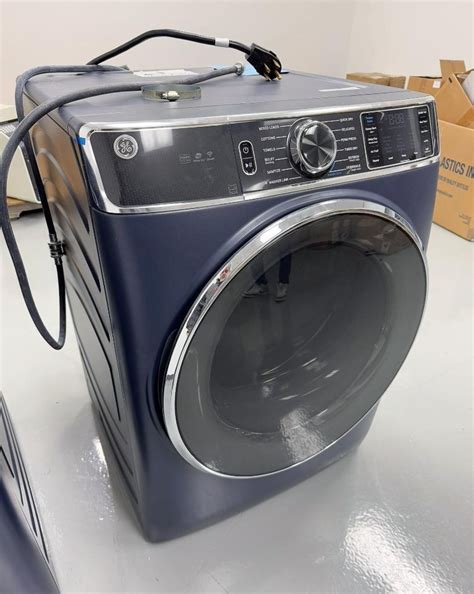 Lot Consisting Of: (1) GE Front load washing machine, model