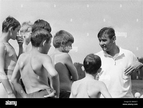 Goal keeper Lev Yashin talks to young football fans Stock Photo - Alamy