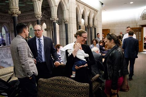 Minister Karina Gould introduces her baby to Cabinet Ministers in Ottawa