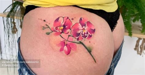 Watercolor Style Orchids Tattooed On The Butt Cheek