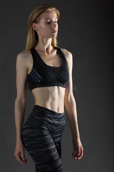 Beautiful Blonde Woman Perfect Athletic Slim Figure Engaged In Yoga Exercise Or Fitness Lead