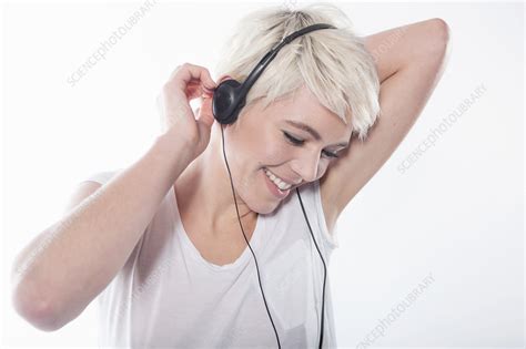 Woman Wearing Earphones Stock Image F007 9474 Science Photo Library