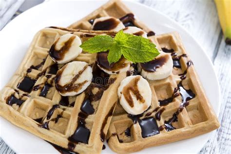 Waffles with Bananas and Chocolate Sauce Stock Image - Image of heap ...