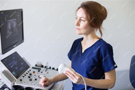 Premium Photo | Doctor woman in uniform sitting in office in hospital ...