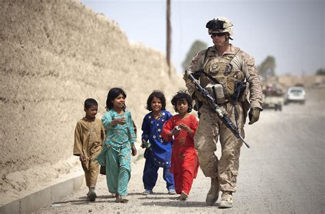 Children Following Marine On Patrol Free Stock Photo - Public Domain