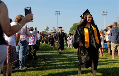 ‘Continue to make us proud’: Spirits high as Smith Voc grads step off