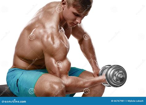 Muscular Man Working Out Doing Exercises With Dumbbells At Biceps Strong Male Naked Torso