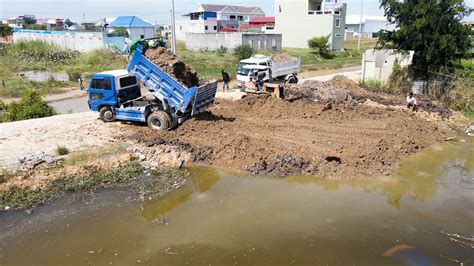 First Starting New Project Showing Dump Truck Dumping Dirt Land Fill