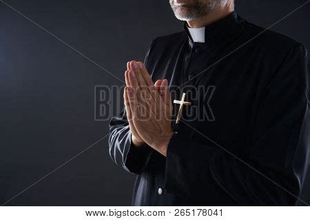 Praying Hands Priest Image & Photo (Free Trial) | Bigstock