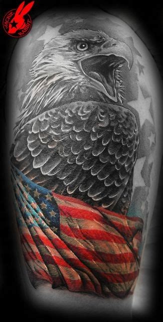 Eagle wrapped in american flag tattoo on arm - Tattooimages.biz