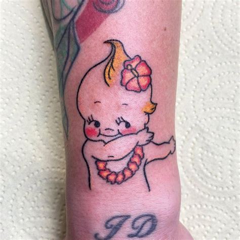 Hand Poked Kewpie Tattoo On The Wrist