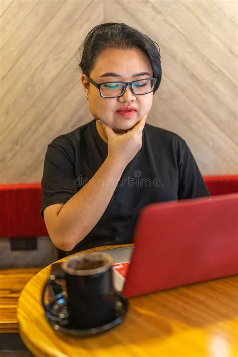 Portrait Of Asian Lesbian Working With Laptop At Coffee Shop Stock Photo Image Of Freelancer