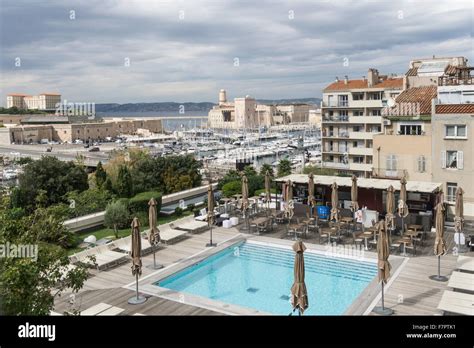 Hotel pool , vieux port, Fortress, Marseille Stock Photo - Alamy