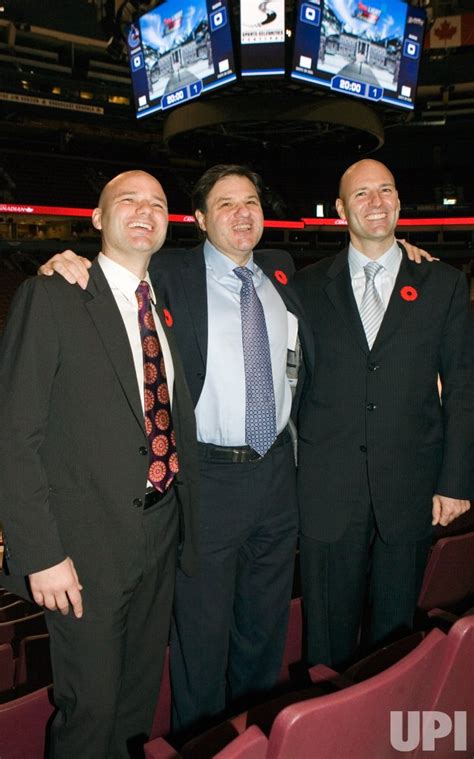 Photo Aquilini Brothers Buy John Mccaws Interest In Vancouver Canucks