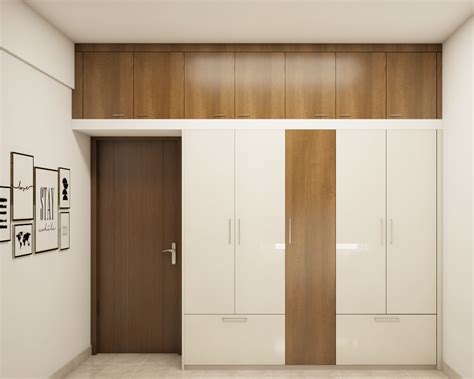 Wooden Laminated Hinged Modern Wardrobe Design With Loft Livspace